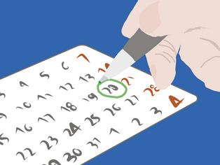 Jemand kreist mit einem Stift ein Datum auf einem Kalender ein